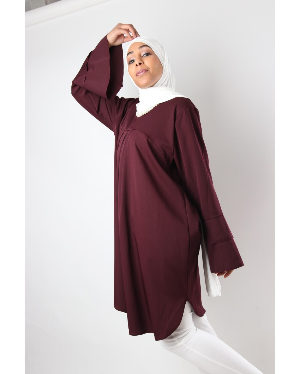 Tunique Chic volant et collier perles