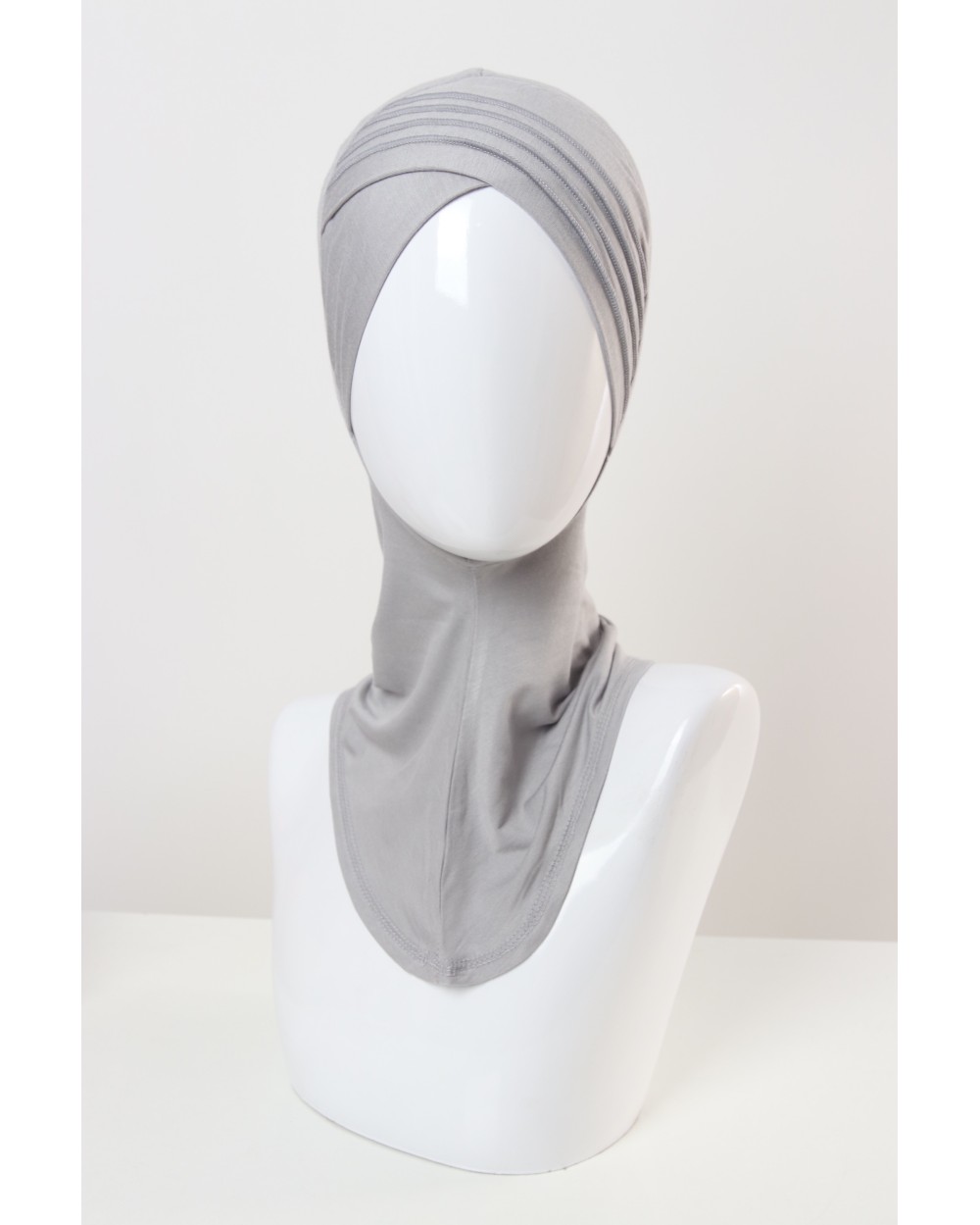 Crossed hood with edging