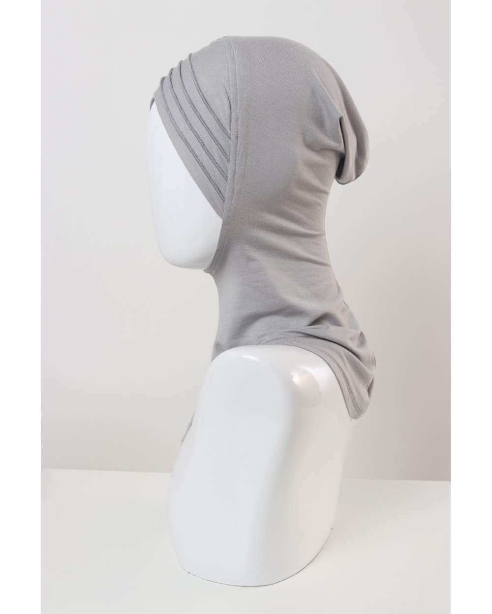 Crossed hood with edging