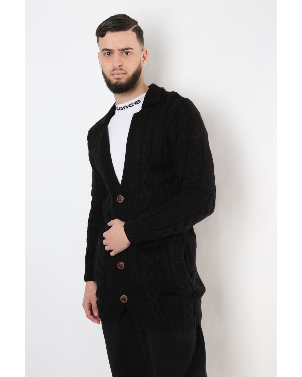 Gilet long à torsades boutonné