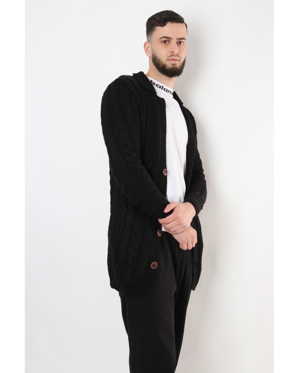 Gilet long à torsades boutonné