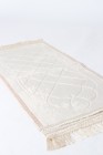 Small padded prayer rug