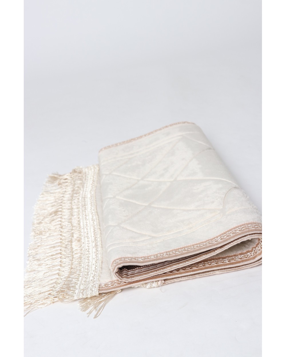 Small padded prayer rug