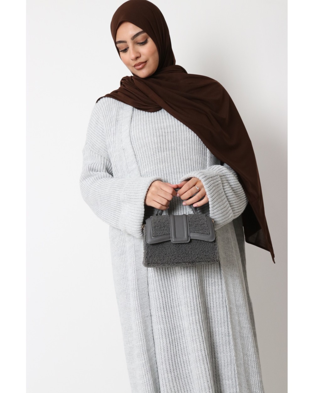 Sleeveless sweater dress and long vest set